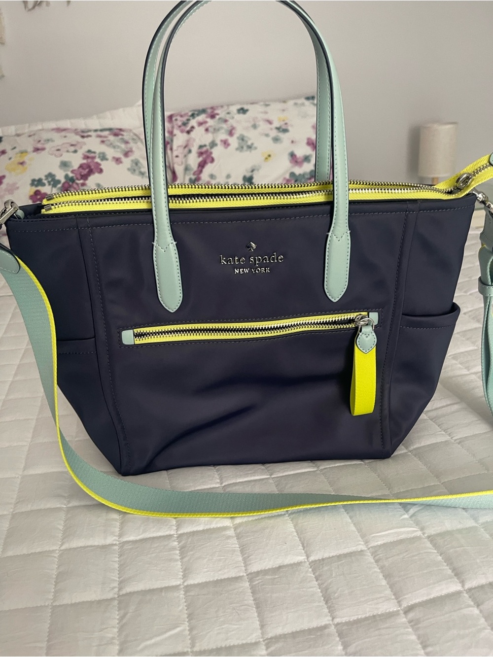 kate spade navy tote with mint handles and yellow accents